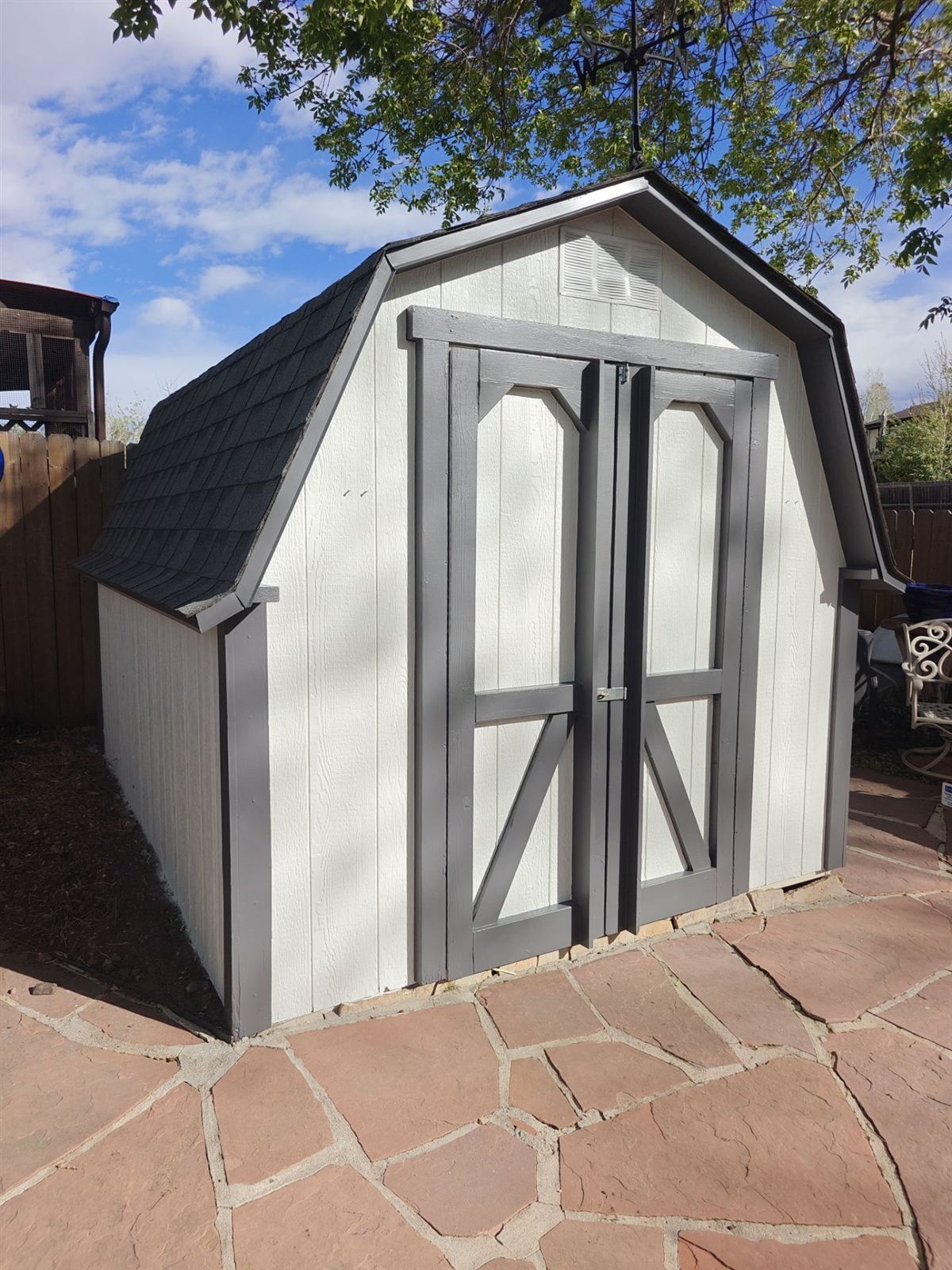House and matching detached shed exterior painting project in Arvada, Colorado