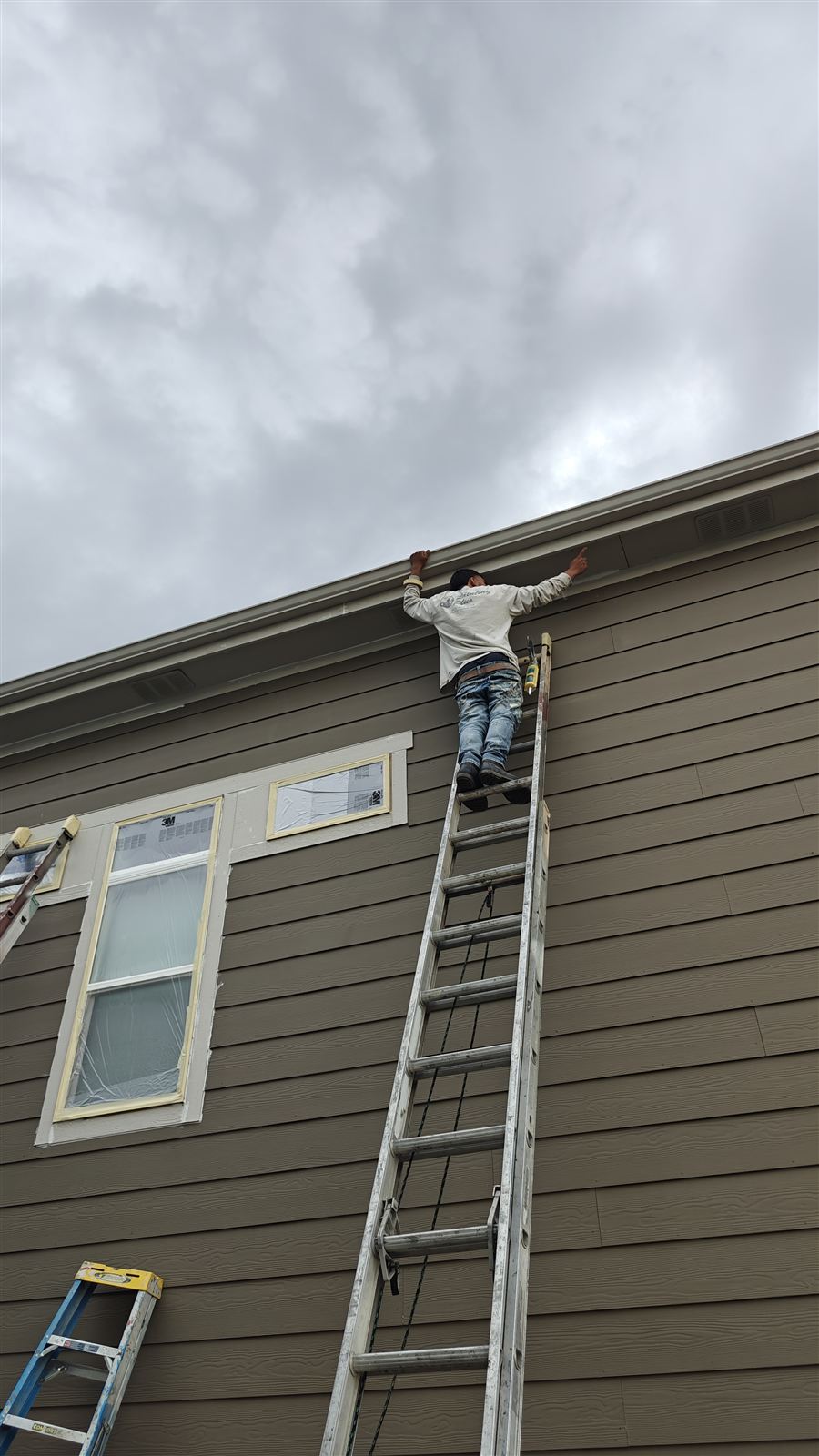 Residential siding painting project near Thornton, Colorado