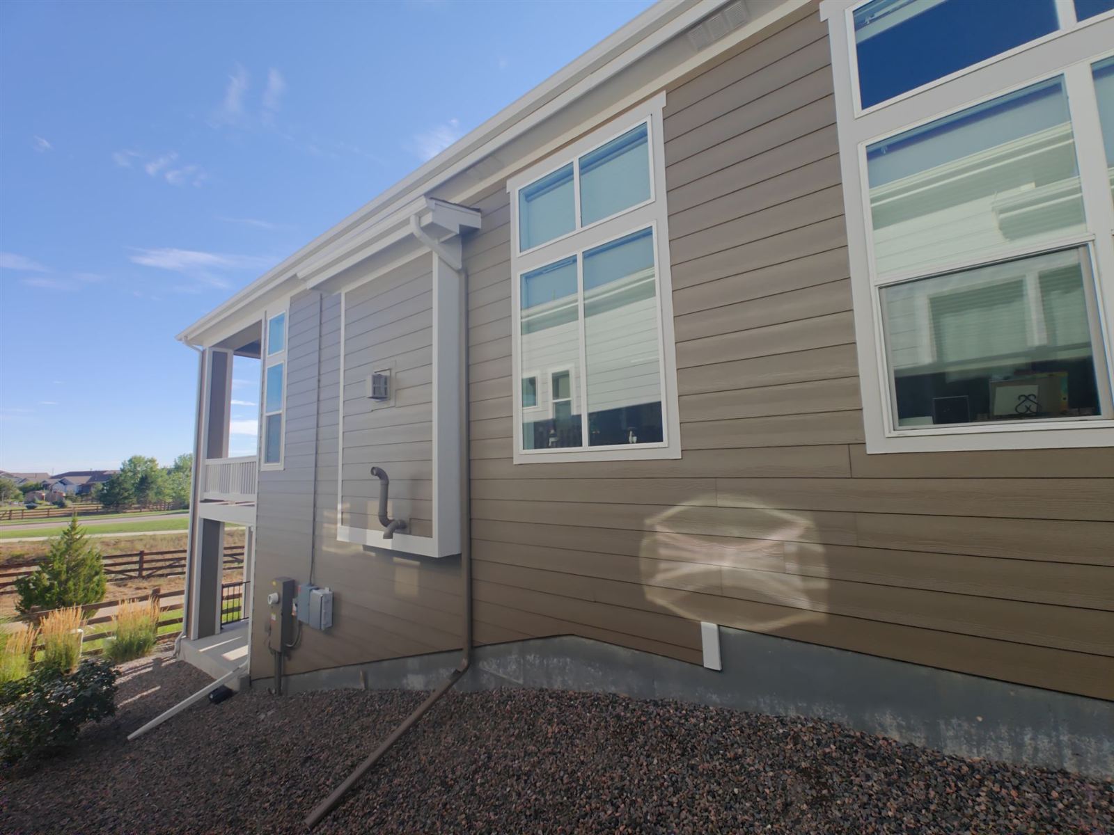 Home exterior with freshly painted siding and trim
